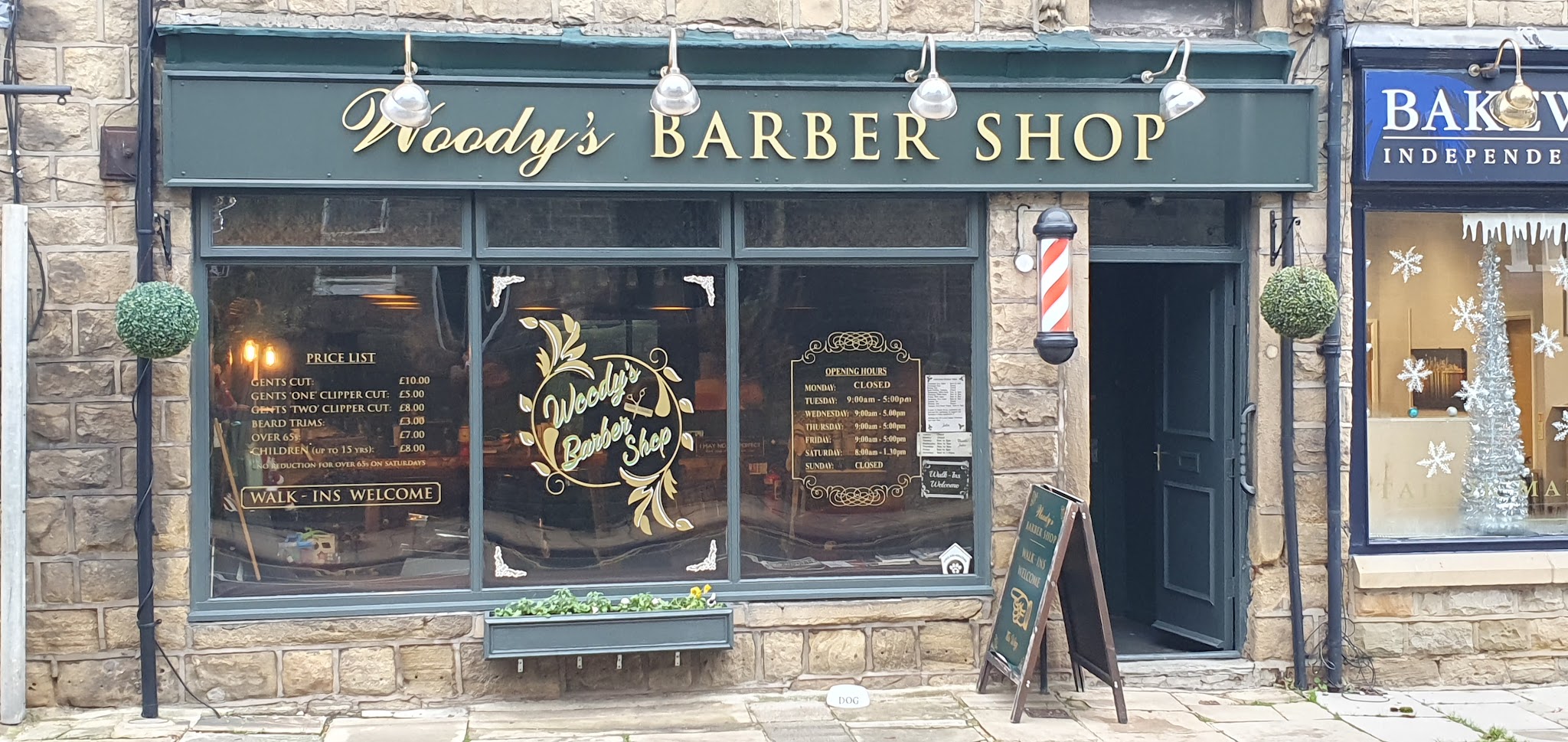Woody's Barber Shop on Leeds Road, with its gold-lettered sign and traditional barber pole